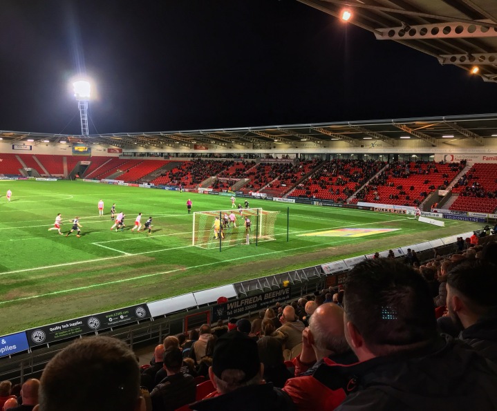Doncaster Rovers supporters watch on as their team attack a corner during the second half of a 3-3 draw with Bury at the Keepmoat Stadium