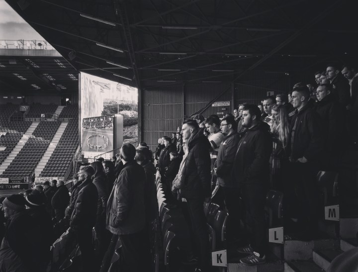 Doncaster Rovers fans during the Remembrance minute's silence ahead of the League One game at The Valley