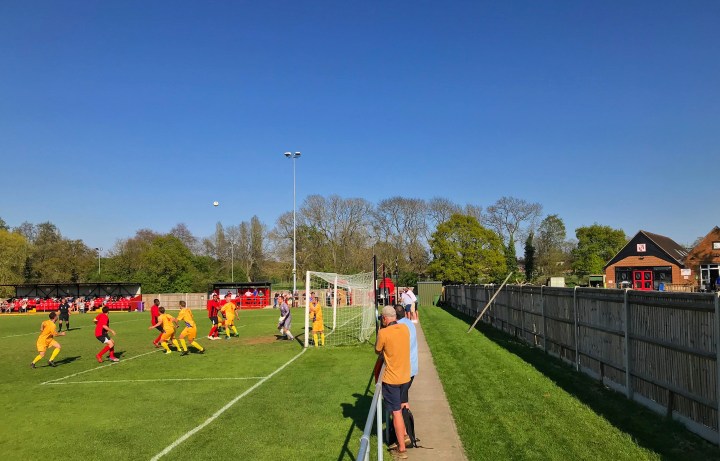 A photographer tries to catch an image of a Glebe corner during the Southern Counties East League Premier Division