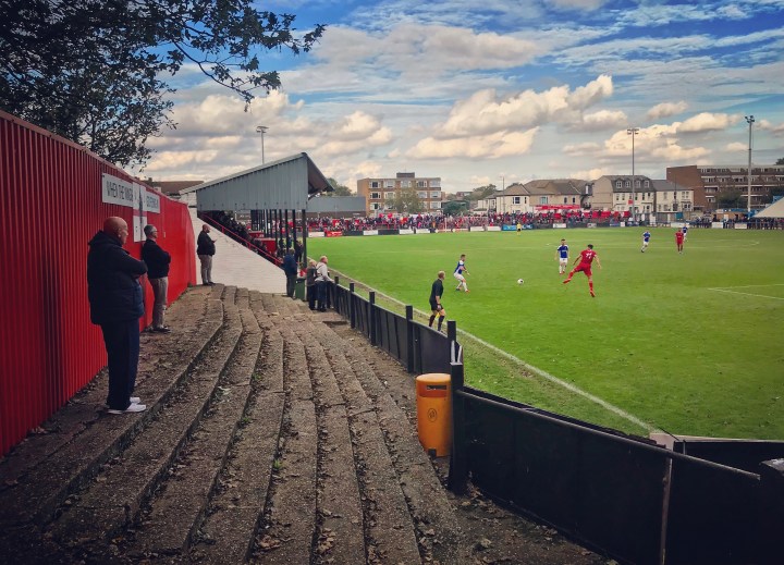 Home fans watch on as Welling United play Tavistock in the FA Cup