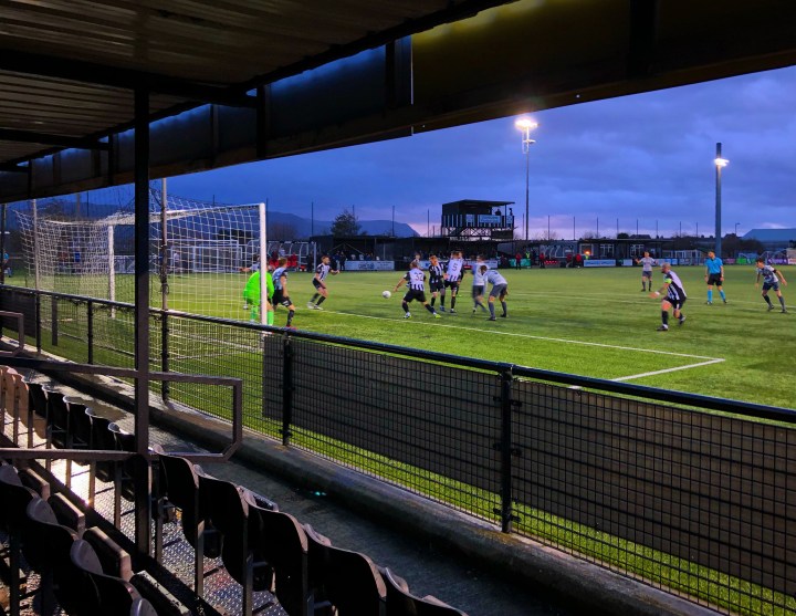 Llandudno successfully defend a corner against Guilsfield at Maesdu Park