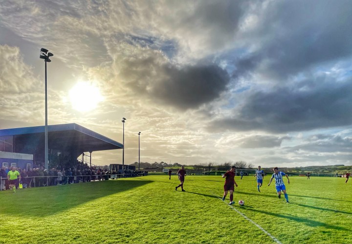 Trearddur Bay attack down their left wing with a low sun at their backs