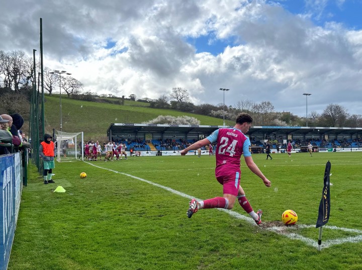 Colwyn Bay take a late corner during a 2-0 home defeat to Caernarfon Town.